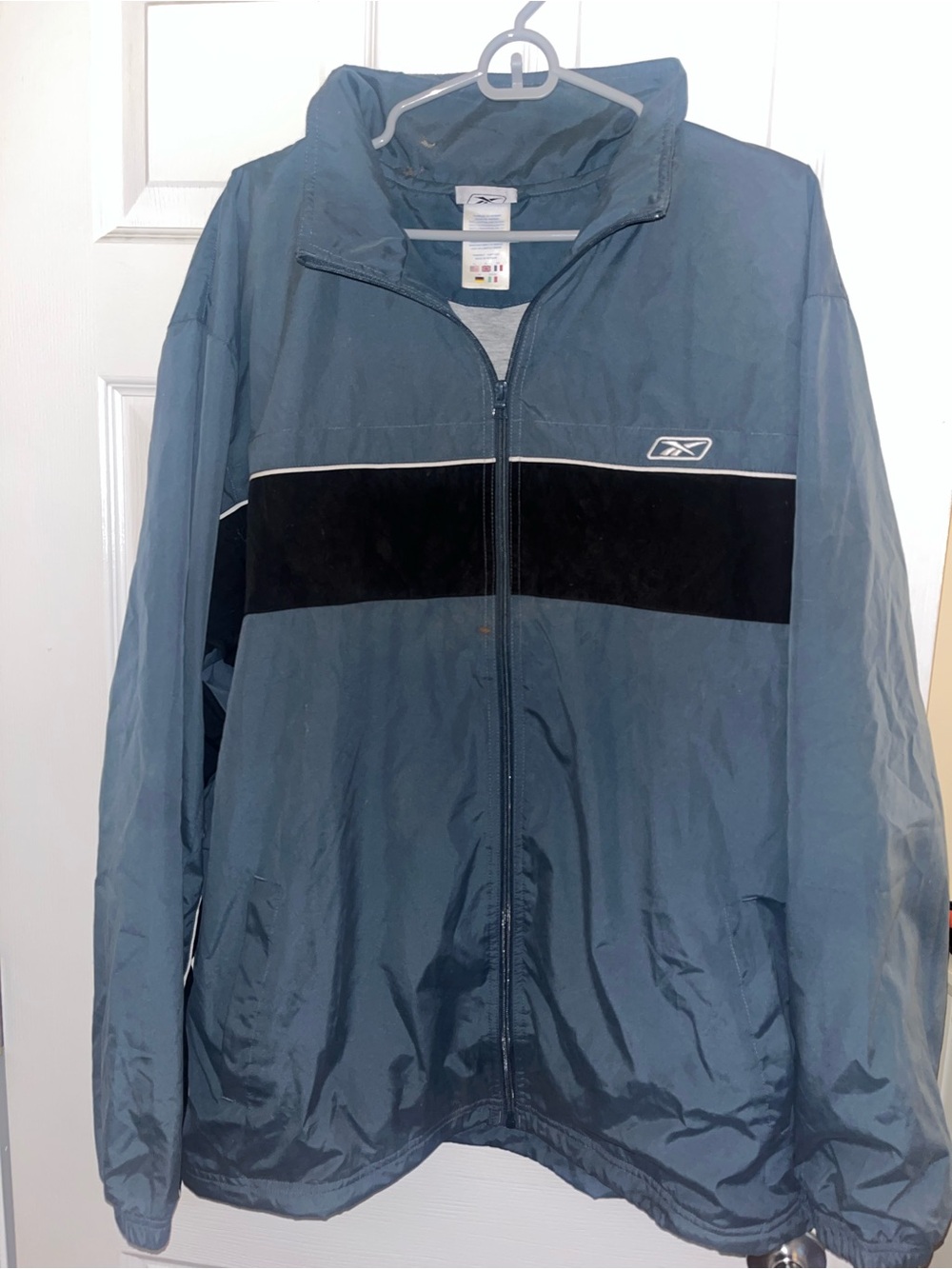 Reebok Men's Slate Blue Windbreaker and Black Pants